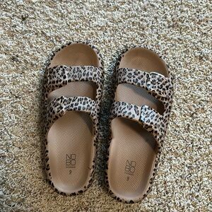 Leopard print sandals.
